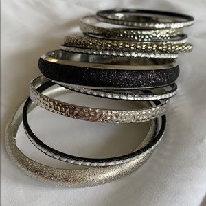 Women’s silver and black bangle bracelets